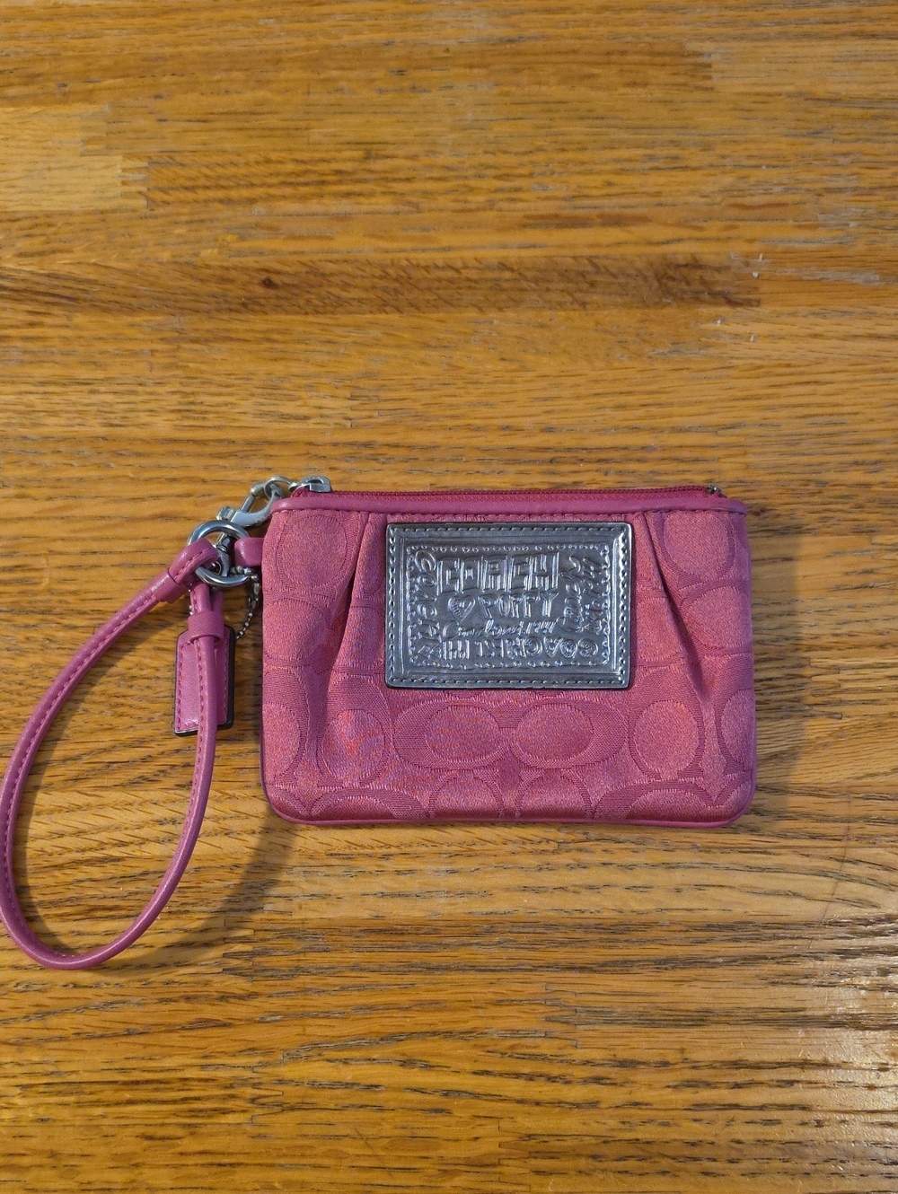 Coach Pink Signature Wristlet with Silver Logo Plaque